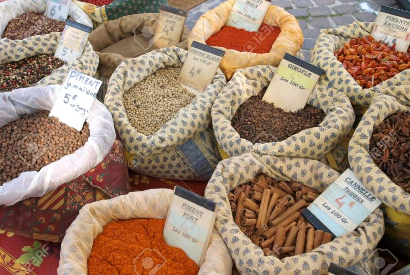 bags of spices on display in a market in provence spices