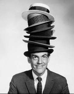 man with many hats