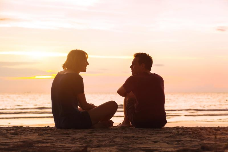 sitting beach sunset